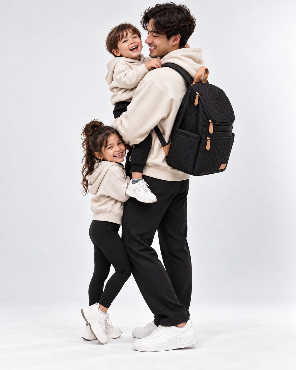 Maison Air parent travel backpack worn by a dad carrying his kids on the school run