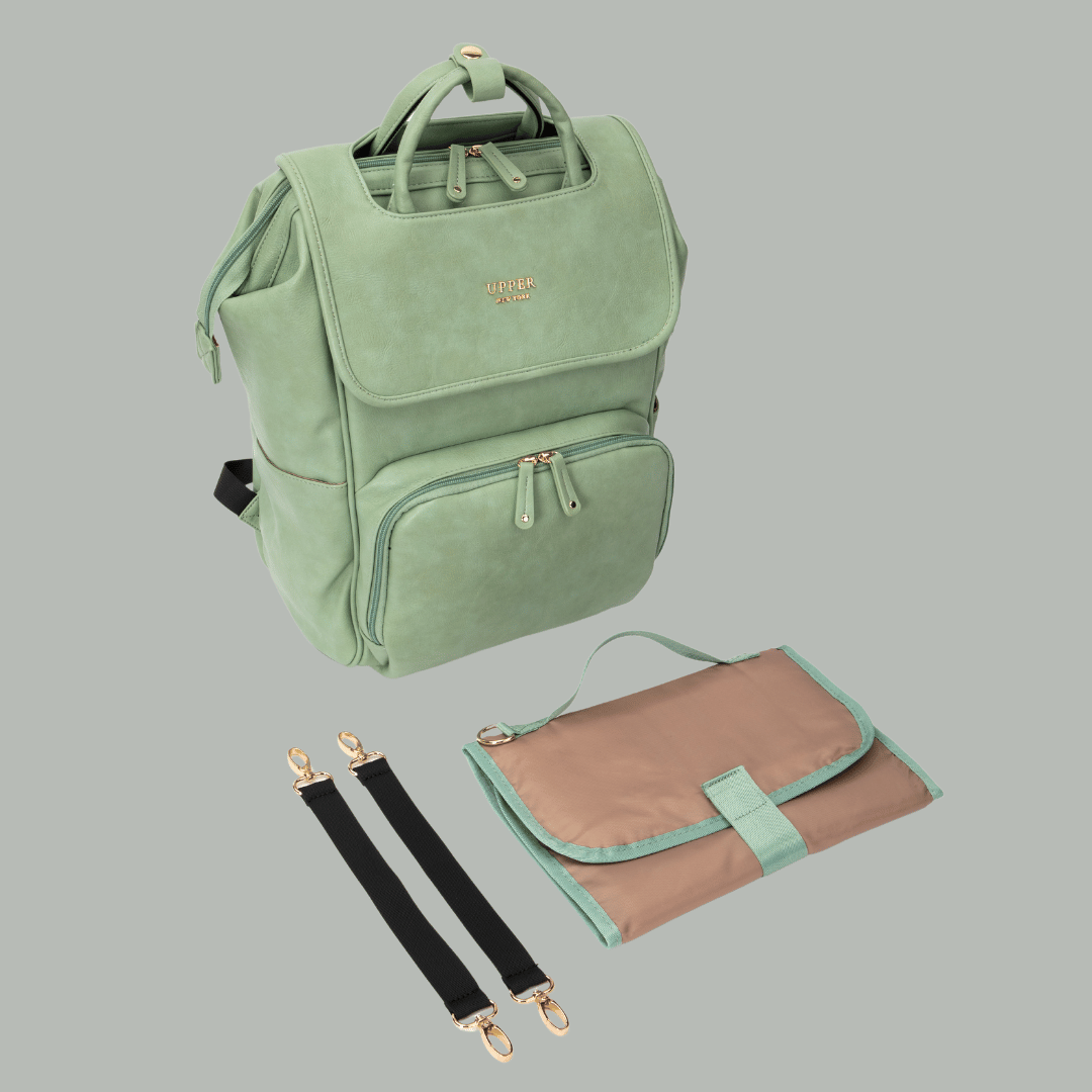 DayFlow everyday backpack for parents in sage green with its mat and stroller straps