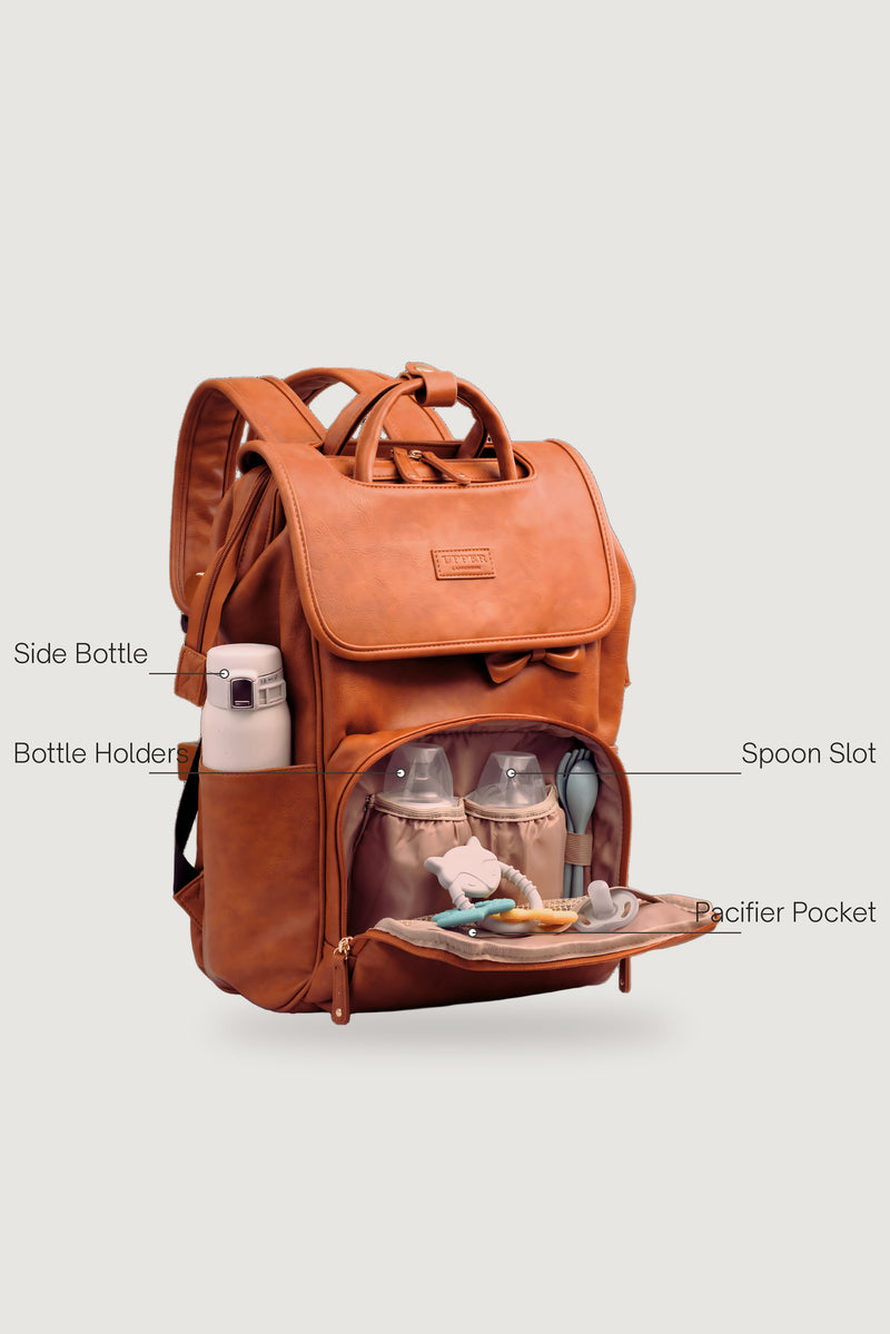 DayFlow 23 parent commuter backpack front pockets, labeled for bottles and quick-grab essentials