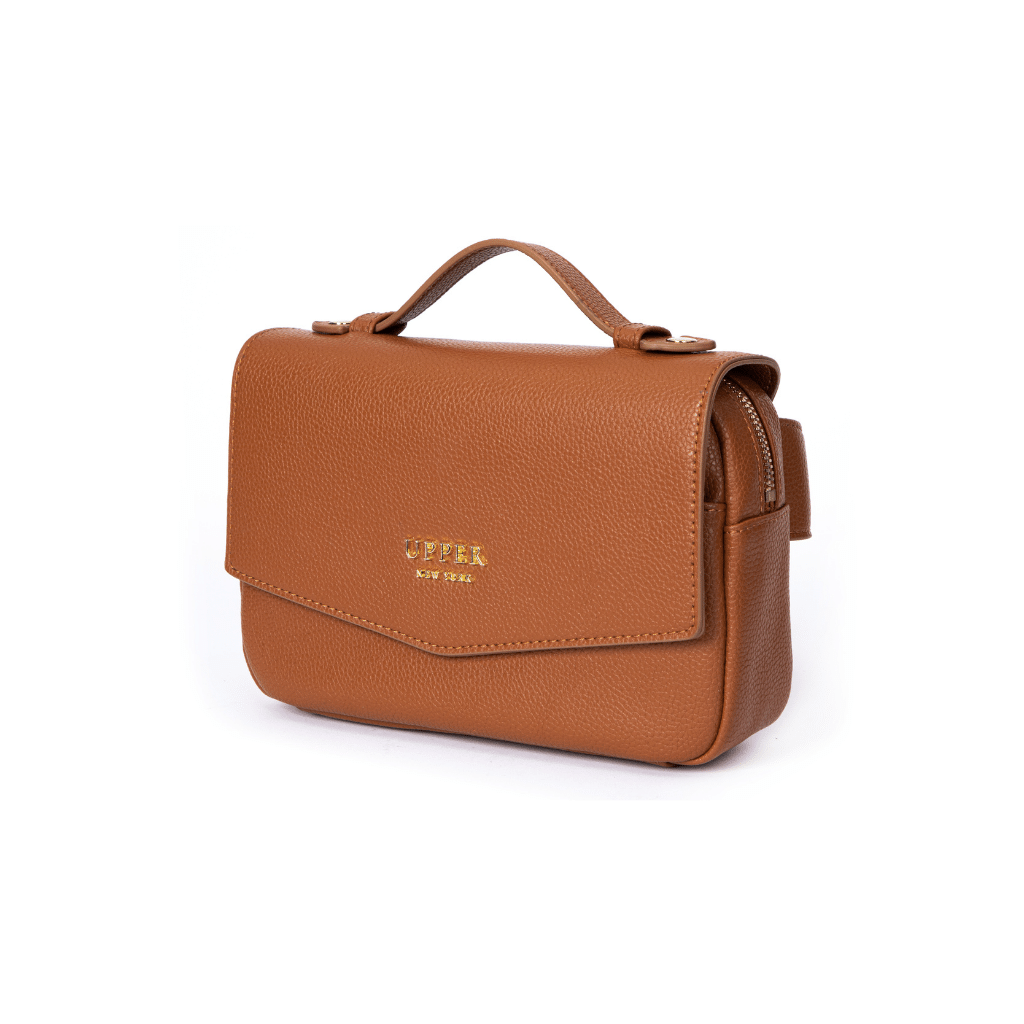 Everyday sling for moms in caramel, three-quarter view with top handle
