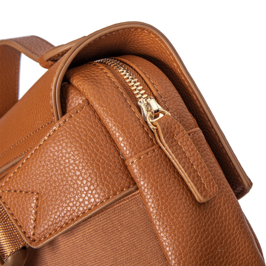 Everyday sling for moms in caramel, close-up of the zip