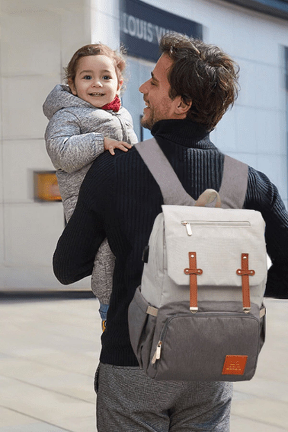 Dad wearing the Milan backpack