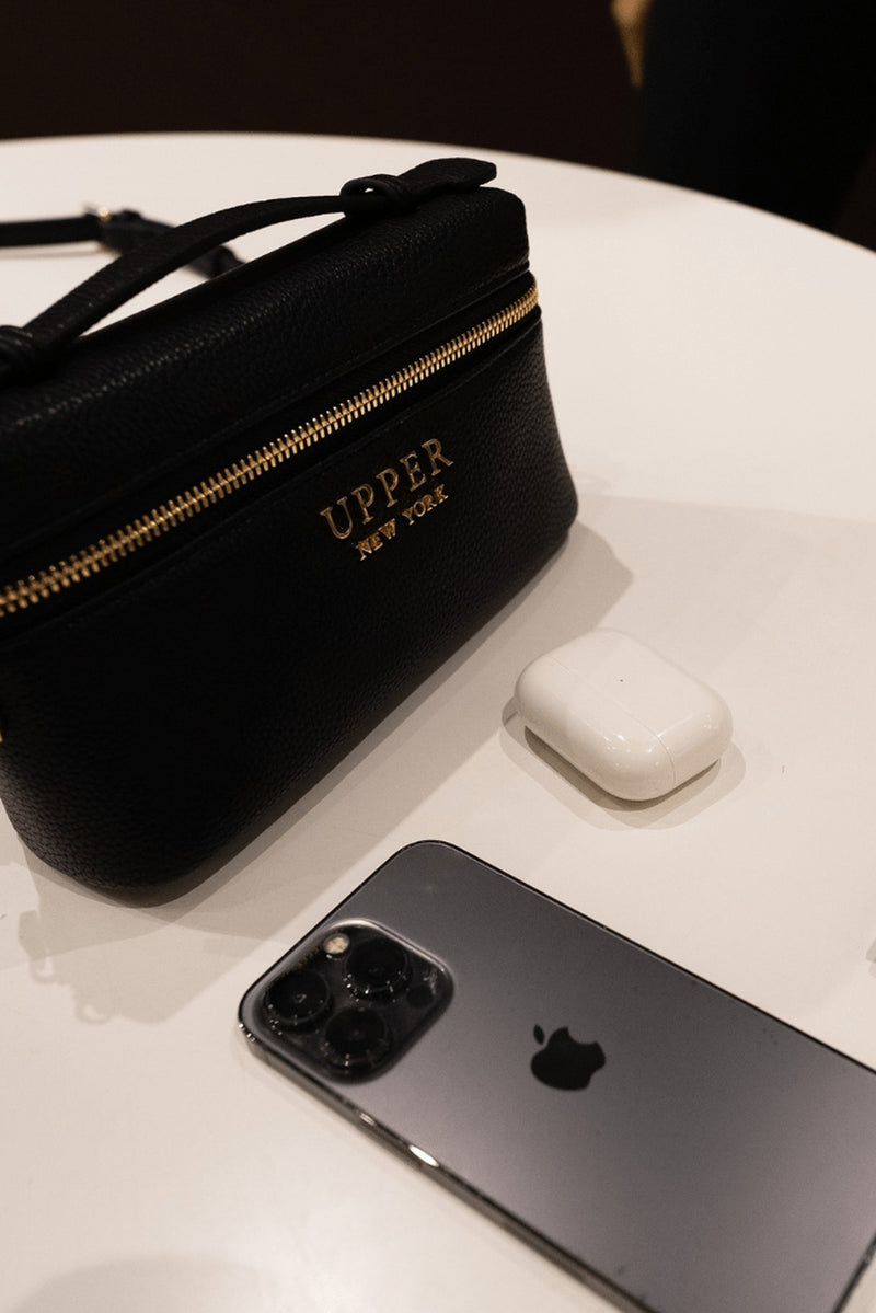 Mini Crossbody worn by a parent
