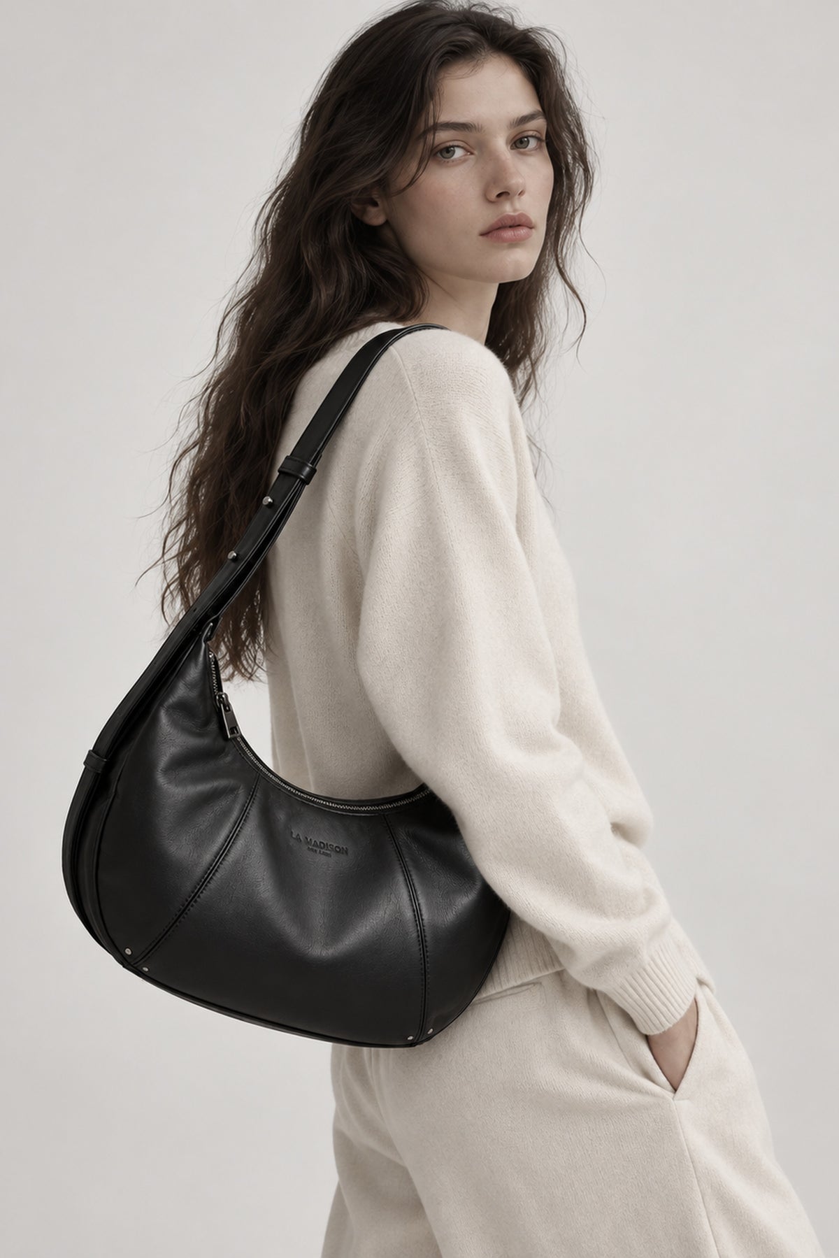 Parent wearing the Rivage crossbody