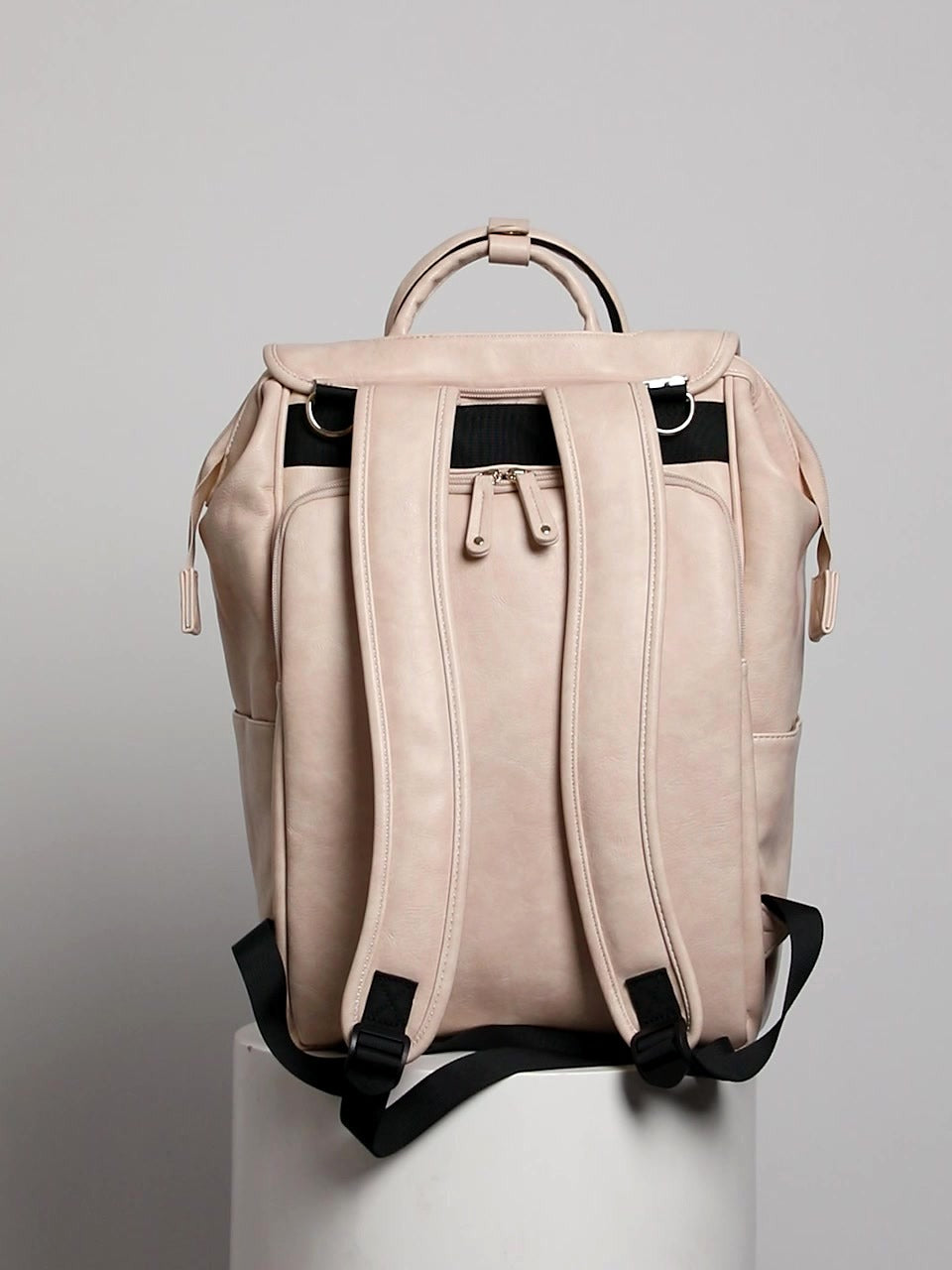 DayFlow everyday backpack in beige, back view with padded shoulder straps