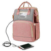 UPPER 549 - Luggage & Bags > Diaper Bags Pink Grey NYC - Easy Travel (Changing Station +  Portable Folding Crib) Diaper Bag Backpack